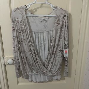 Torrid new with tags cross over top in floral print size 2